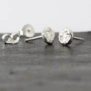 sterling silver studs: Melted, abstract and unique.