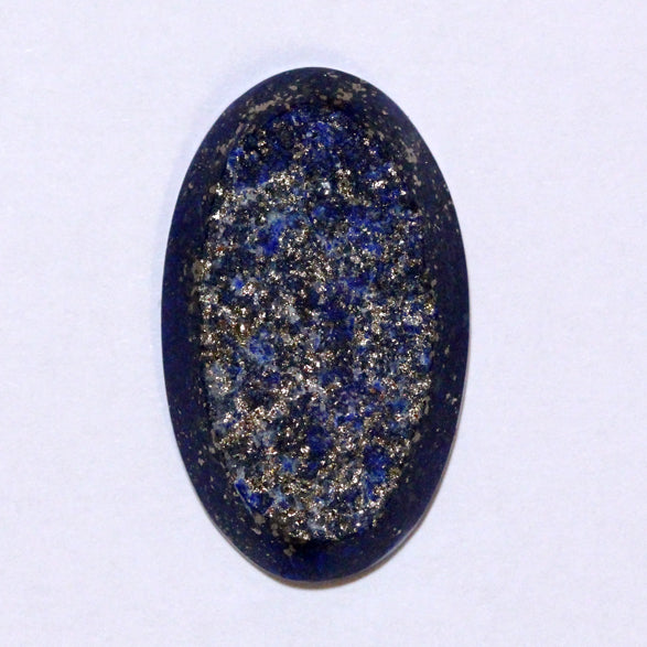 Lapis Lazuli. Rough face with many sparkling Golden Pyrite inclusions