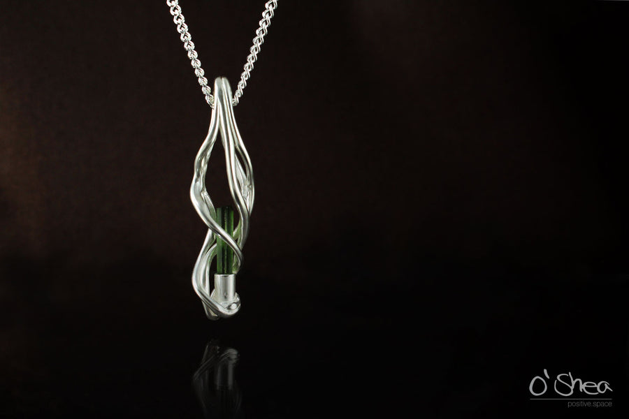 Silver pendant: This tourmaline crystal is thousands of years old!