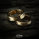 Wedding Rings: engraved lines represent the flow through love and life