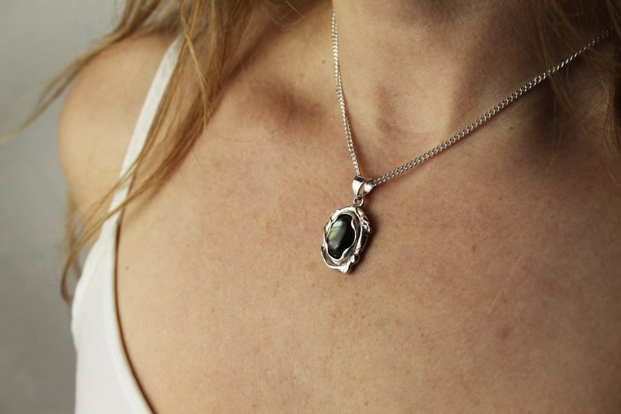 Melted Silver with a beautiful Labradorite Gem